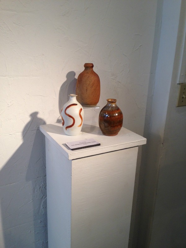Trio of wood-fired bottles displayed at a juried show at the Art Center Manatee.Trio of wood-fired bottles displayed at a juried show at the Art Center Manatee.